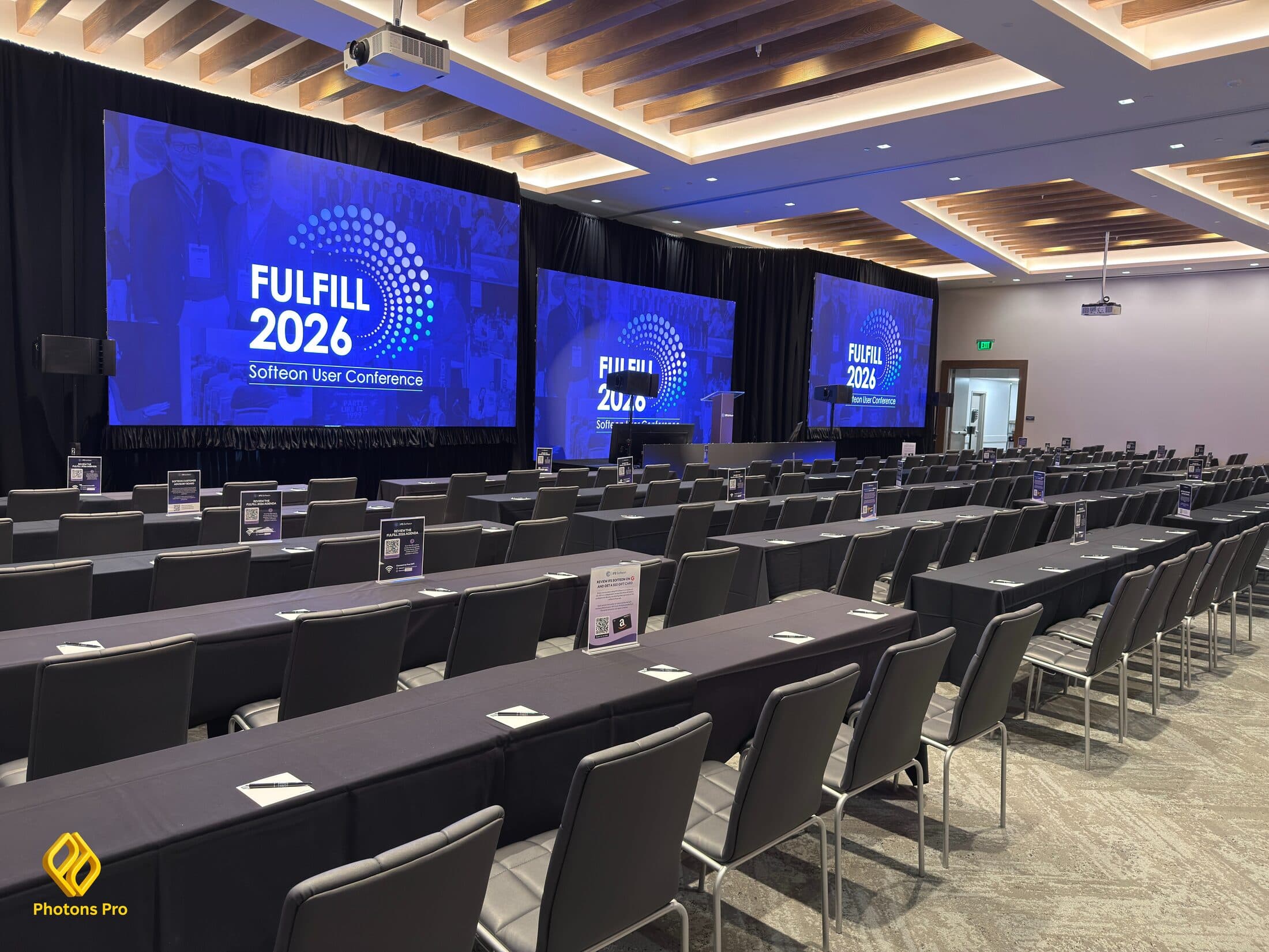 Conference AV setup with screens, microphones and technical support for corporate meetings in NYC.